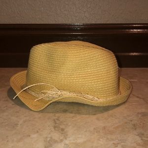 Tan hat with straw band.